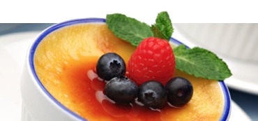 creme brûlée topped with fruit