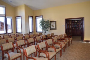 Rows of chairs set up in sitting room