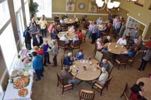 Dining room with people sitting at tables