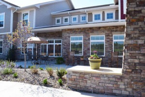 Exterior patio with table and chairs at Covenant Living of Bixby